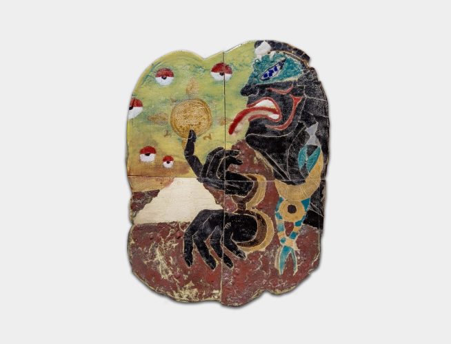 Mural cerámico con símbolos mexicas y rostro oriental inspirado en papiros japoneses y Rinnegan – Tlalticpac